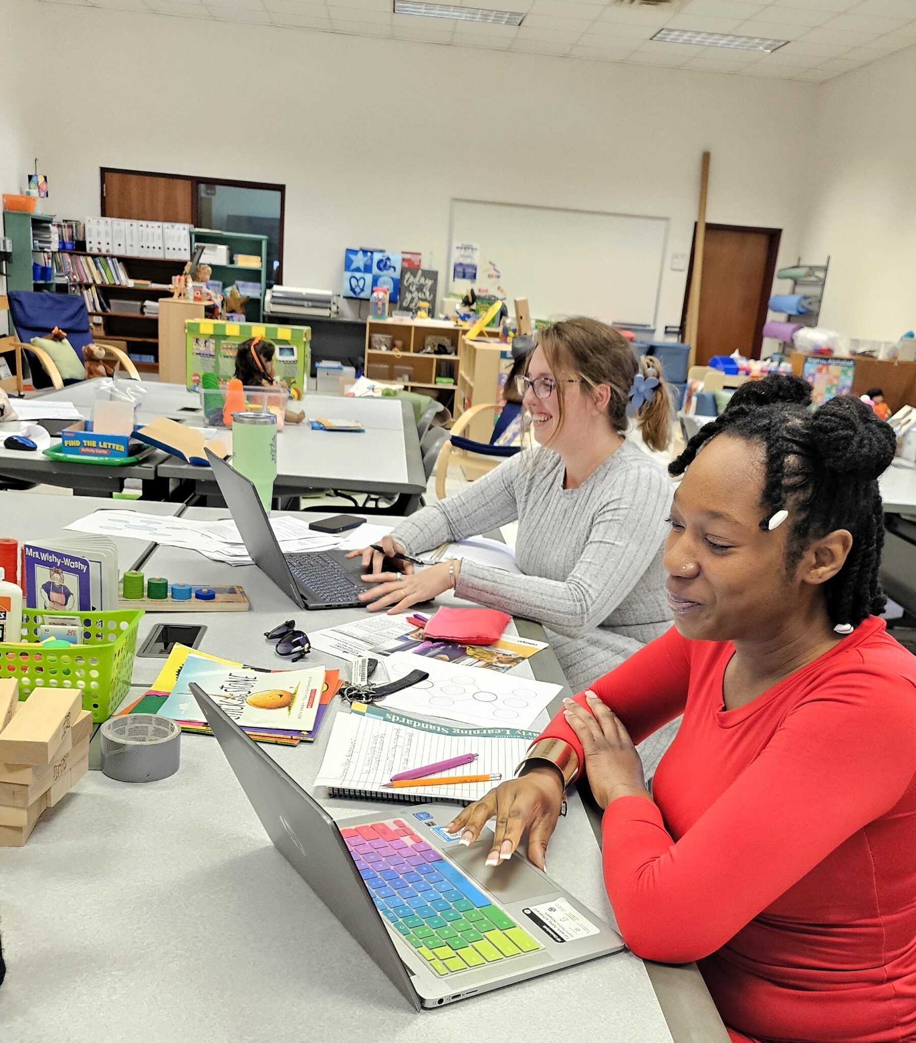 Women using computers in classroom