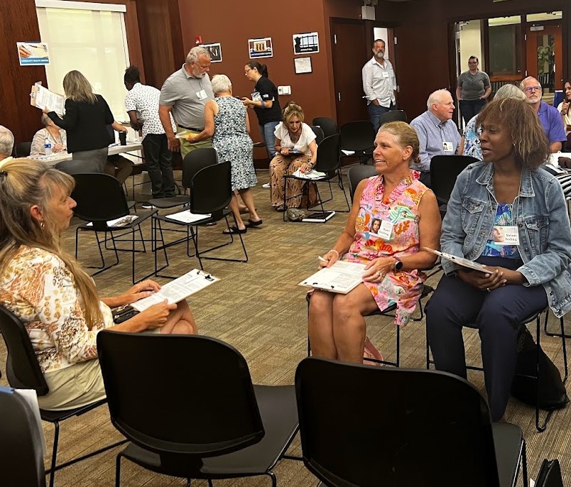 People meeting during poverty simulation